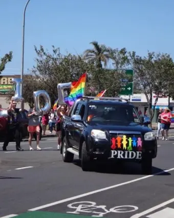 Cover page of the Pride of the South — Pride March report